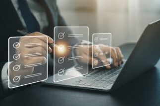 Person at computer working on digital transparency and security.