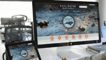 Desktop computers displaying the Burlington, NC website