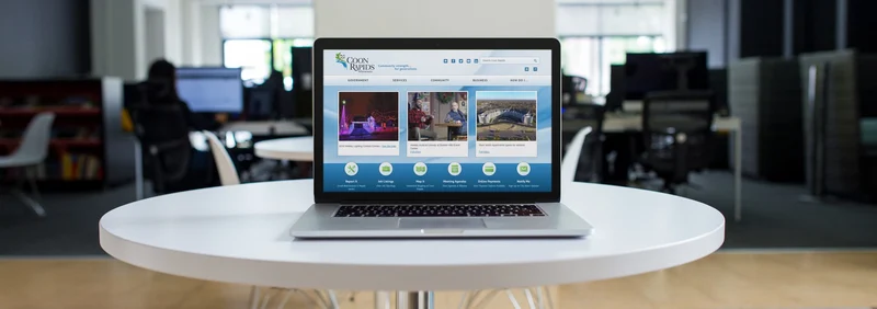 Coon Rapids, MN website displayed on a laptop computer