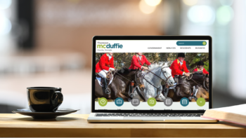 Laptop displaying the McDuffie County, FL website homepage