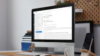 Desktop computer and phone on a work desk